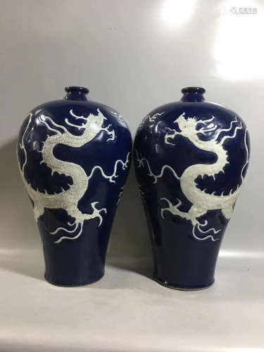 A PAIR OF DRAGON PATTERN BLUE GLAZED PLUM VASES