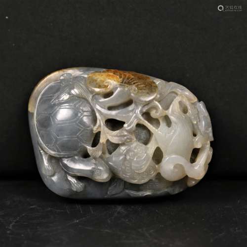 Finely Carved Black and White Jade Ornament
