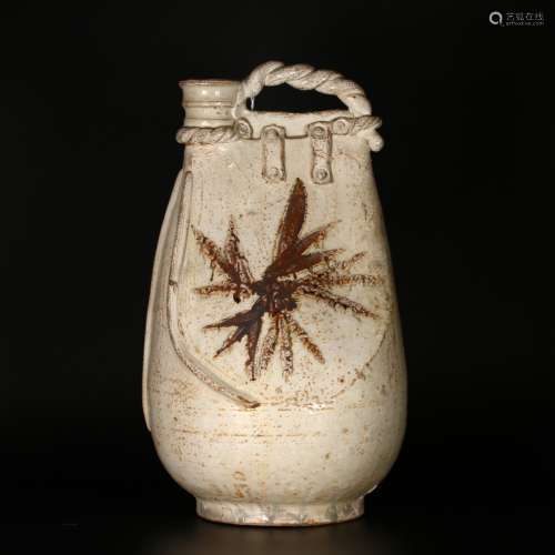 A rare Chinese buff-glazed pottery flask,Liao dynasty