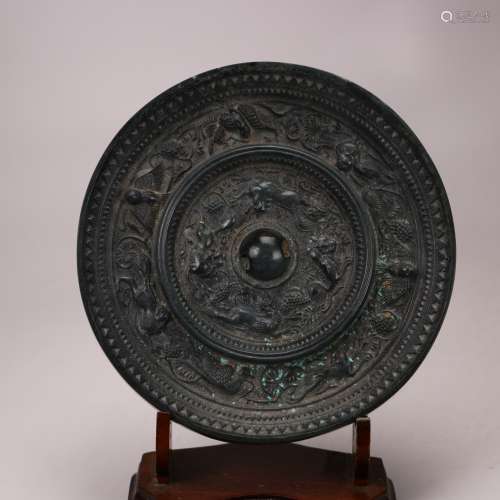 A Chinese Carved Bronze Mirror, Han Dynasty