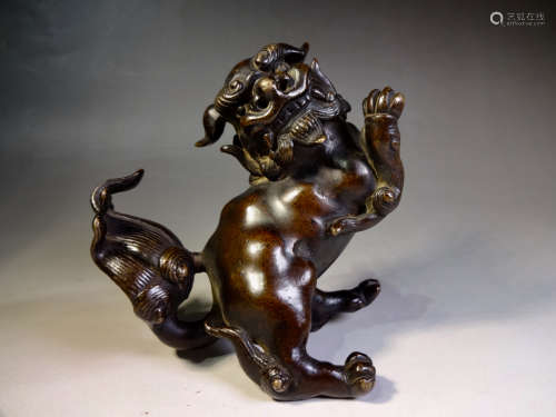 A chinese qing dynasty bronze paperweight