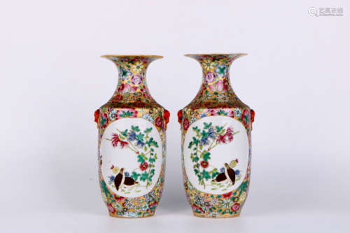 A pair of chinese famille rose vases