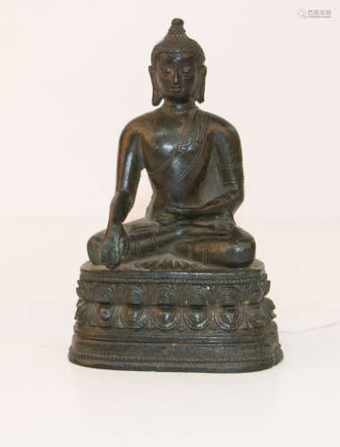 A chinese bronze buddha statue