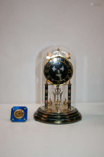 A enamel clock and a germany 19c bronze