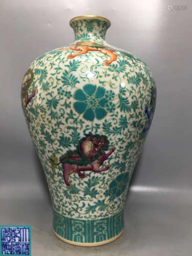 A GREEN FLORAL AND COLOR BEAST PATTERN MEI VASE