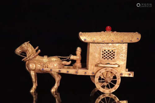 A GILT BRONZE HORSE AND CAR SHAPED ORNAMENT