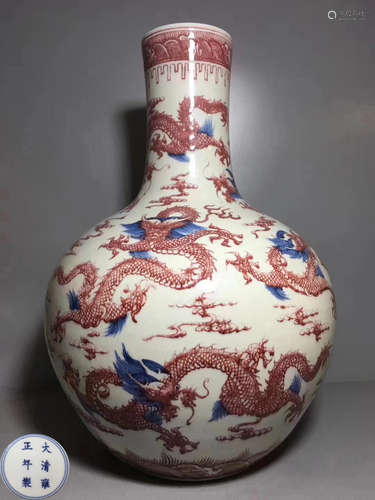 A UNDERGLAZED RED DRAGON PATTERN TIANQIU VASE