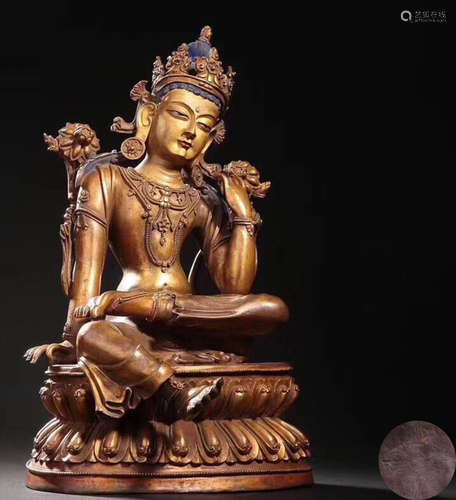 A GILT BRONZE MOLDED BUDDHA STATUE