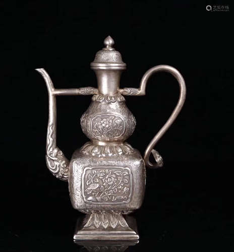 A SILVER MOLDED GOURD SHAPED TEAPOT