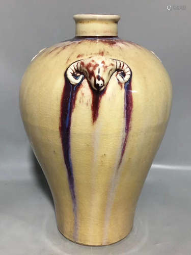 A GOAT-EAR VARIABLE GLAZE PLUM VASE