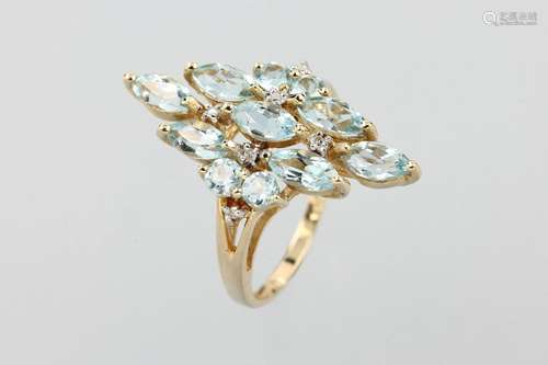 14 kt gold ring with aquamarines