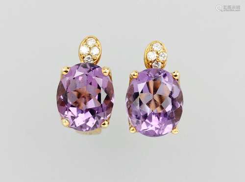 Pair of 18 kt gold STERN earclips with amethysts and brilliants