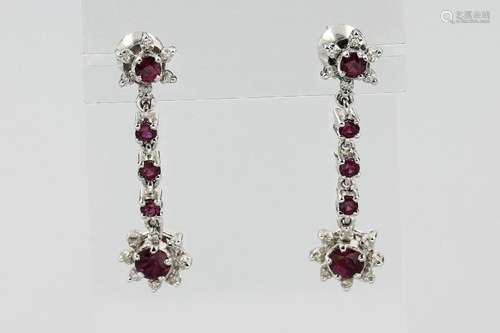 Pair of 14 kt gold earrings with rubies and diamonds