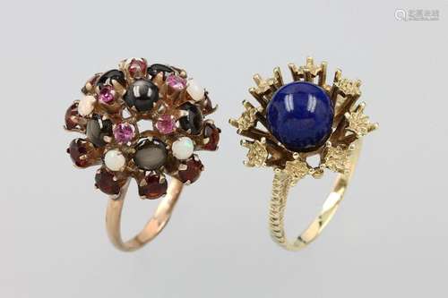 Lot 2 14 kt gold rings with gem stones