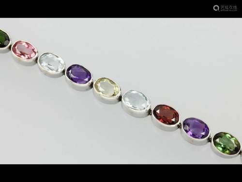 14 kt gold bracelet with coloured stones