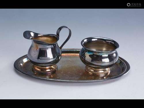 Milk jug and sugar bowl on tray