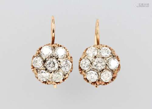 Pair of 18 kt gold earrings with diamonds