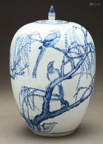 Chinese Covered Urn Decorated with Fanciful Birds and Flowering Trees in Underglaze Blue.