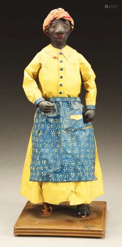 Folk Art Composition and Cloth Black Doll of a Woman with Bandanna.