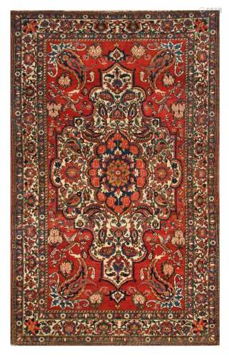 A FINE BAKHTIARI RUG, WEST PERSIA approx: 7ft.5in. x 4ft.7in.(226cm. x 140cm.) This rug has full pile and very good colour combination. Bold appearance. Selvages rebound, well done. Very slight fraying at one end. In general very good usable condition, attractive
