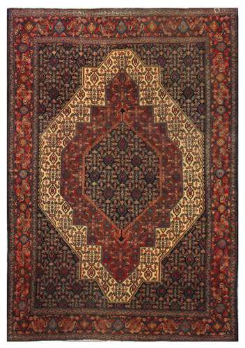 A FINE SENNEH RUG, WEST PERSIA approx: 7ft.1in. x 4ft.1in.(215cm. x 150cm.) Classic for this type. Well drawn design and well blended colours. The pile has slight wear to the top, barely visible, selvages original with touches of fraying on wool bounding in few small places on cord. Ends with short fringes, secured. Elegant and popular type at present market, ca.1910-20