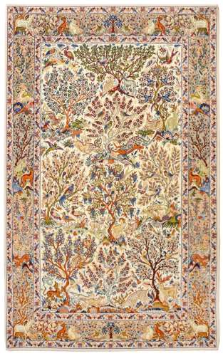 AN EXTREMELY FINE PART SILK ISFAHAN RUG, CENTRAL PERSIA approx: 5ft.11in. x 3ft.6in.(180cm. x 107cm.) Lovely garden design with flowering trees, animals and perching birds surrounded by similar design border. this tug has full pile with very fine wool and part silk. Extremely fine weave, approx; 10  x 10 knot per sq. cm; woven on silk foundation. Ends and selvages original. Excellent condition throughout. Attractive, ca.1950's