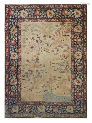 AN ANTIQUE TABRIZ RUG, NORTH-WEST PERSIA approx: 6ft.2in. x 4ft.7in.(188cm. x 140cm.) Unusual design with trees, animals and serpent. Slight overall wear. Selvages original. Ends original with touches of fraying. Good usable condition.