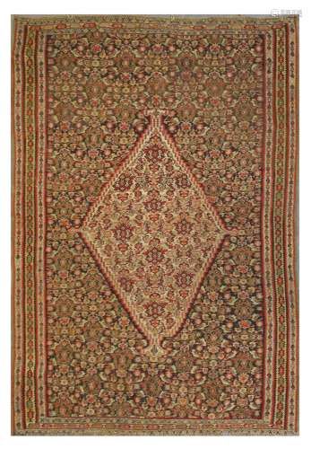 A FINE SENNEH KILIM, WEST PERSIA approx: 6ft.5in. x 4ft.5in.(196cm. x 135cm.) Classic for this type. Selvages original, one end slightly fraying. In general very good usable condition. Attractive.