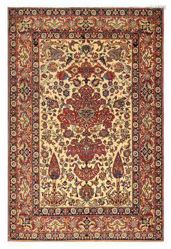 A VERY FINE ISFAHAN RUG, CENTRAL PERSIA approx: 7ft.2in. x 4ft.9in.(218cm. x 145cm.) Beautifully drawn design with very good colour combination. Bold appearance. This rug has full pile, kurk wool quality, soft and lustrous. In general this piece is in very good condition. Selvages are rebound, well done. Ends with short fringes, secured. Vey fine weave. approx; 8 x8 knots per sq. cm. Very attractive and lovely furnishing piece. ca.1920