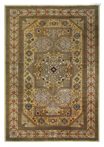 AN ARDEBIL CARPET, NORTH PERSIA approx: 9ft.11in. x 5ft.8in.(302cm. x 173cm.) The sandy-yellow field with large hooked medallion and bold angular pendants flanked by hooked octagons and various angular small panels. All surrounded by hooked bar border between floral, reciprocal and plain stripes. This rug has good pile. Ends and selvages are original. Good colour combination and well drawn design. In general this carpet is in vey good usable condition throughout. Attractive and nice furnishing piece.