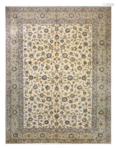 A FINE KASHAN CARPET, CENTRAL PERSIA approx: 13ft.8in. x 10ft.4in.(416cm. x 314cm.)Very good overall design and lovely pastel colours. This carpet has full pile. Good wool quality. Ends and selvages original. In general this piece is in very good condition throughout. Attractive and very good furnishing piece . Mid 20th century