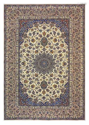 AN EXTREMELY FINE PART SILK ISFAHAN RUG, CENTRAL PERSIA approx:7ft.7in. x 5ft.2in.(231cm. x 157cm. Very nice drawn design and well balanced colours. this rug has full pile, top kurk wool quality and apart of tiny wear to the top pile at the edge on one end, this rug is in very good condition. Ends and selvages original. Extremely fine weave 10 x 109 knots per sq. cm; woven on silk foundation. Attractive, ca.1950
