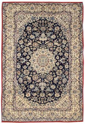AN EXTREMELY FINE PART SILK NAIN RUG, CENTRAL PERSIA approx: 5ft.4in. x 3ft.7in.(163cm. x 109cm.) This rug has full pile, top kurk wool quality, very soft. Silk used on the field and border motifs 11 x 11 knots per sq. cm; ends and selvages original. Well drawn design and well blended colours. in general this rug is in very good condition throughout. Attractive. ca.1930-40