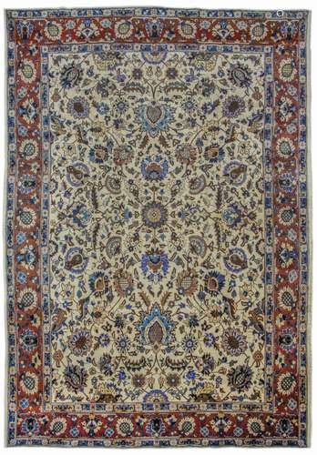 A TABRIZ CARPET, NORTH-WEST PERSIA approx: 12ft.11in. x 9ft.5in.(394cm. x 286cm.) The ivory field with overall design of bold polychrome palmettes and angular floral and leafy vine. In shaded light-rust border of similar design between light blue rosette and leafy vine stripes. Outer plain stripe. This carpet has good pile and very good design. Selvages original. Ends with short fringes. secured. In general this piece is in very good usable condition. Attractive and very good furnishing piece. Woven, ca.1920