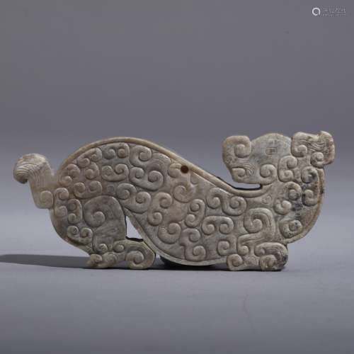 A Carved Archaic Jade Dragon Pendant