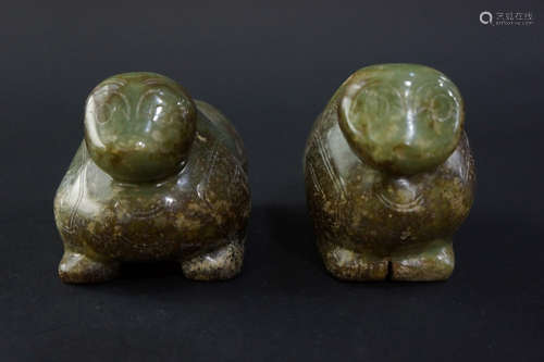 A PAIR OF GU JADE SLAVE