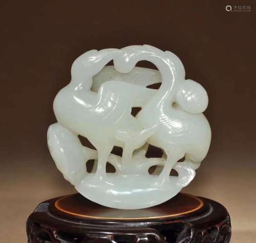 A HOLLOW CARVED WHITE JADE PENDANT