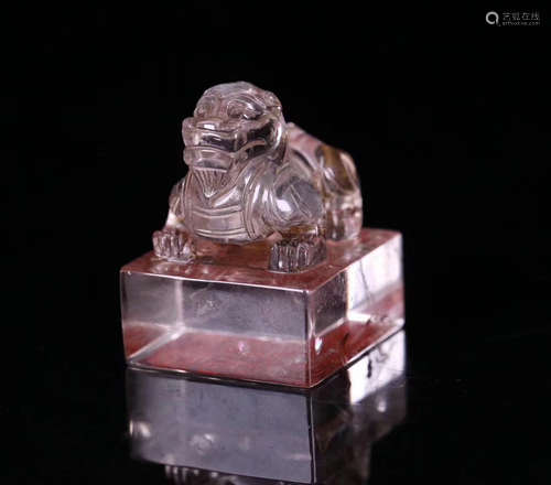 A CRYSTAL CARVED BEAST SHAPED SEAL