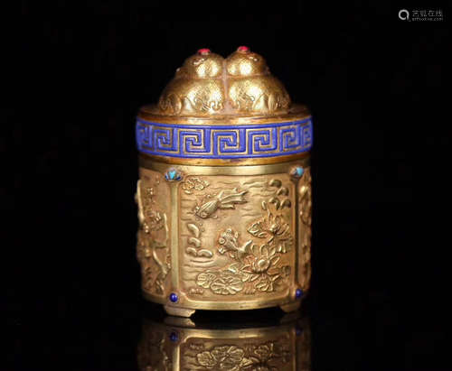 A GILT SILVER MOLDED COVER JAR