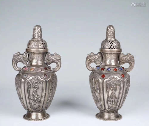 PAIR SILVER MOLDED BOTTLE VASES