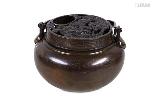 A CHINESE SILVER-INLAID BRONZE HAND WARMER, AND COVER. 19th Century. The globular body set with a