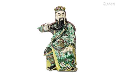 A CHINESE FAMILLE VERTE FIGURE OF WENCHANG WANG. Qing Dynasty, 19th Century. Seated in flowing