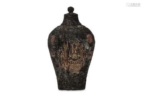 A CHINESE INK CAKE VASE. Of baluster form, moulded with a Buddhist scene surrounded by seals, with