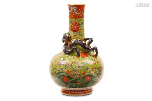 A CHINESE GREEN-GROUND ‘DRAGON’ VASE. Qing Dynasty. Of pear-shaped form, decorated with dragons