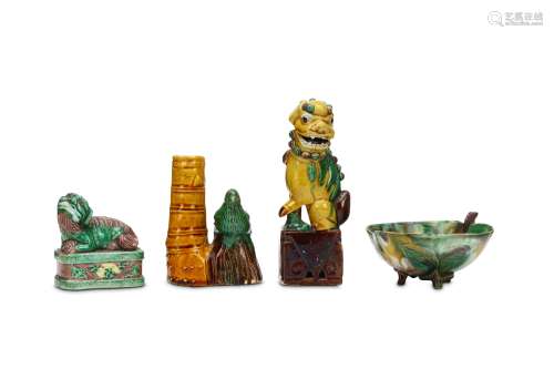 FOUR CHINESE FAMILLE VERTE BISCUIT GLAZED PIECES. Comprising two Buddhist lion dogs, a bird and