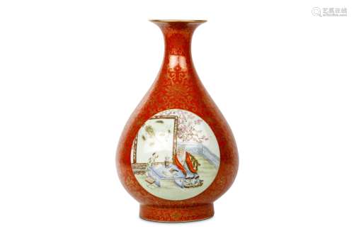 A CHINESE CORAL-GROUND GILT-DECORATED FAMILLE-ROSE VASE. Of pear-shaped form decorated with two