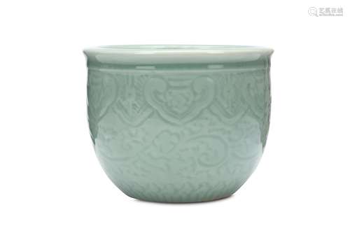 A CHINESE INCISED CELADON JARDINIÈRE. 19th Century. With steeply rounded sides and a jutting rim,