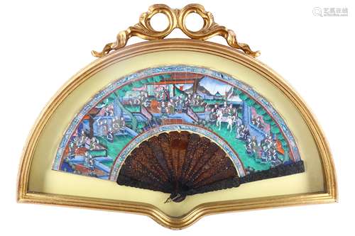 A CHINESE PAINTED CANTON FAN WITH TORTOISESHELL LEAVES. 19th Century. Painted with a landscape