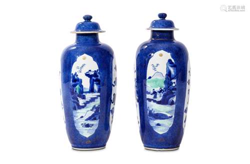 A PAIR OF CHINESE POWDER BLUE JARS AND COVERS. Qing Dynasty, Kangxi era. Decorated with quatrefoil