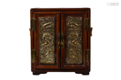 A CHINESE BRONZE MOUNTED HARDWOOD CABINET. Late Qing Dynasty. The double-fronted cabinet inset with